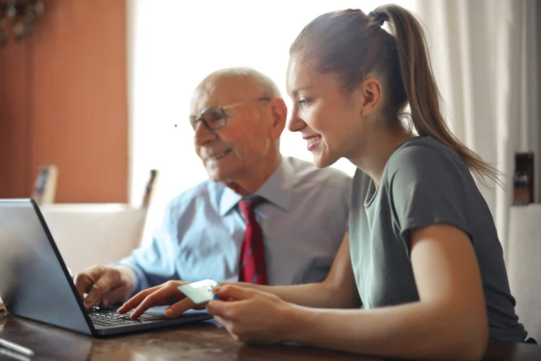 Woman going over her credit report with her consumer protection lawyer.